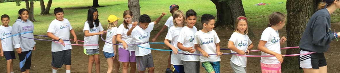 campers forming a hula hoop chain